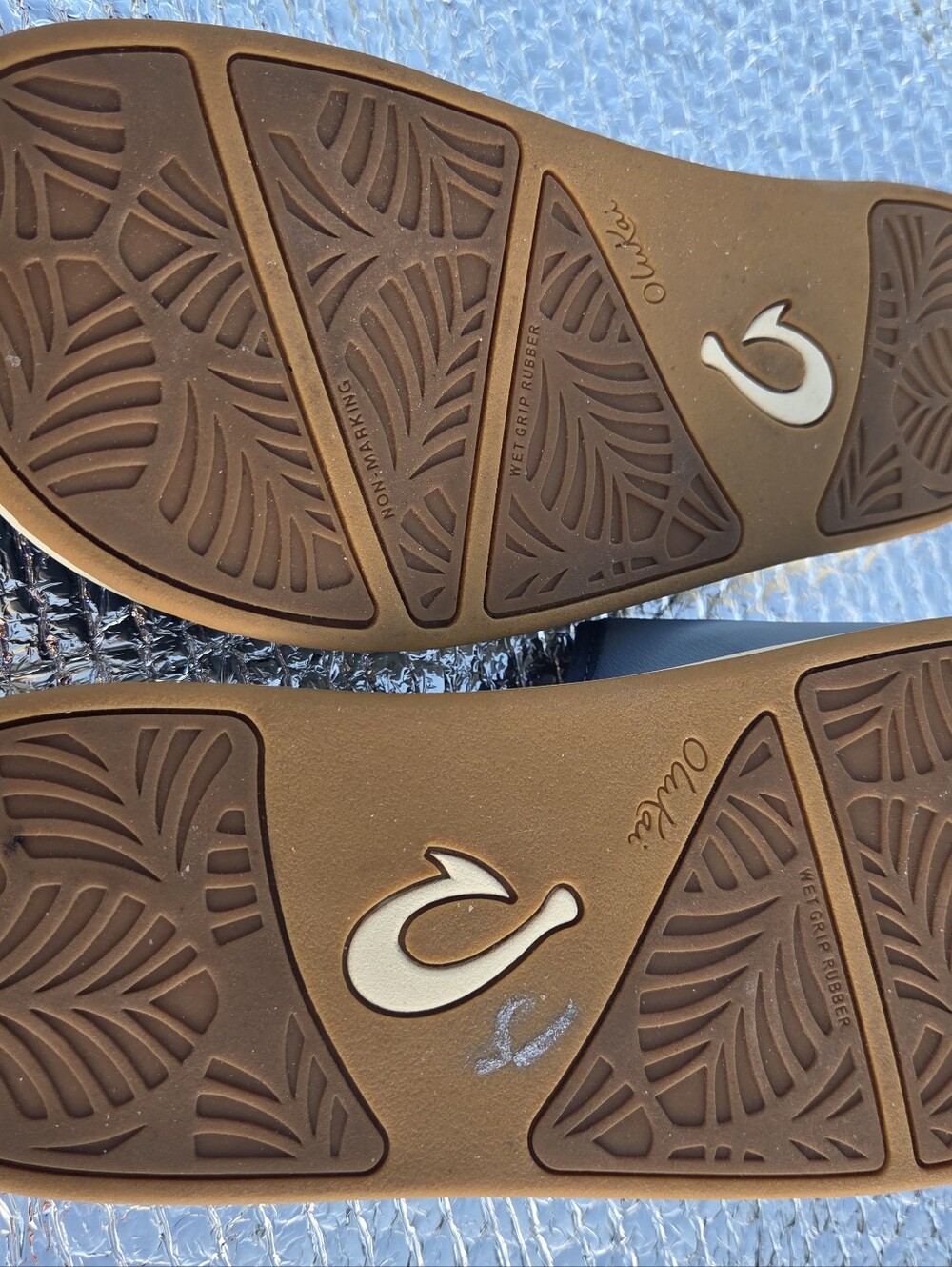 Olukai Nu'a Olu Women's Slide Sandals With Embossed Floral Footbed View 6